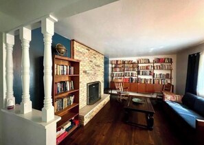 Smart TV, fireplace, DVD player, books
