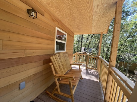 Property grounds. Cowboy Cabin is a quiet place to camp in the woods with the amenities of home.