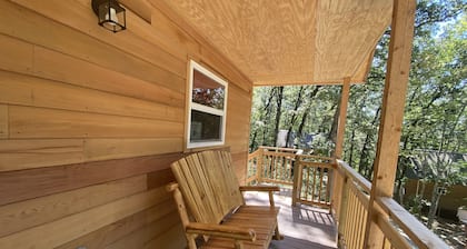 Cowboy Cabin is a quiet place to camp in the woods with the amenities of home.