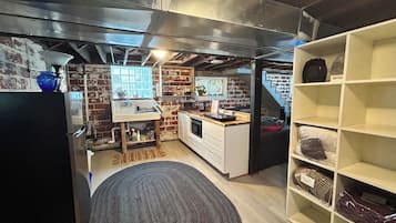 Fridge, microwave, stovetop, coffee/tea maker