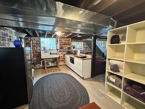 Fridge, microwave, stovetop, coffee/tea maker