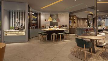 A modern interior with a central bar area, seating, and a kitchen counter.