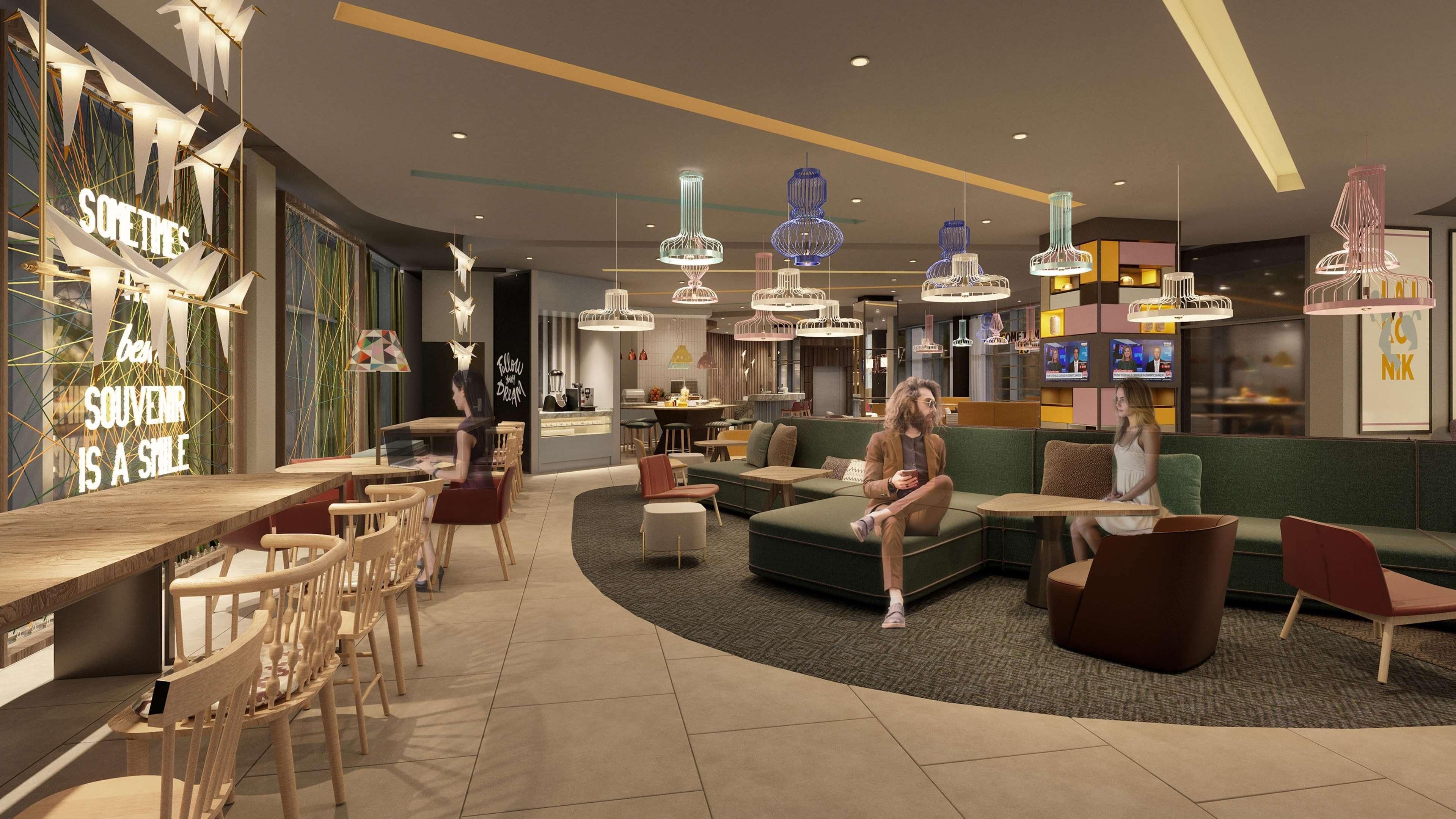 A modern interior with a bar area, seating arrangements, and unique lighting fixtures.