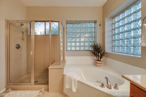 Combined shower/tub, hair dryer, towels, soap