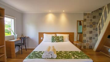 Cabaña de lujo | Minibar, caja de seguridad en la habitación y cortinas blackout