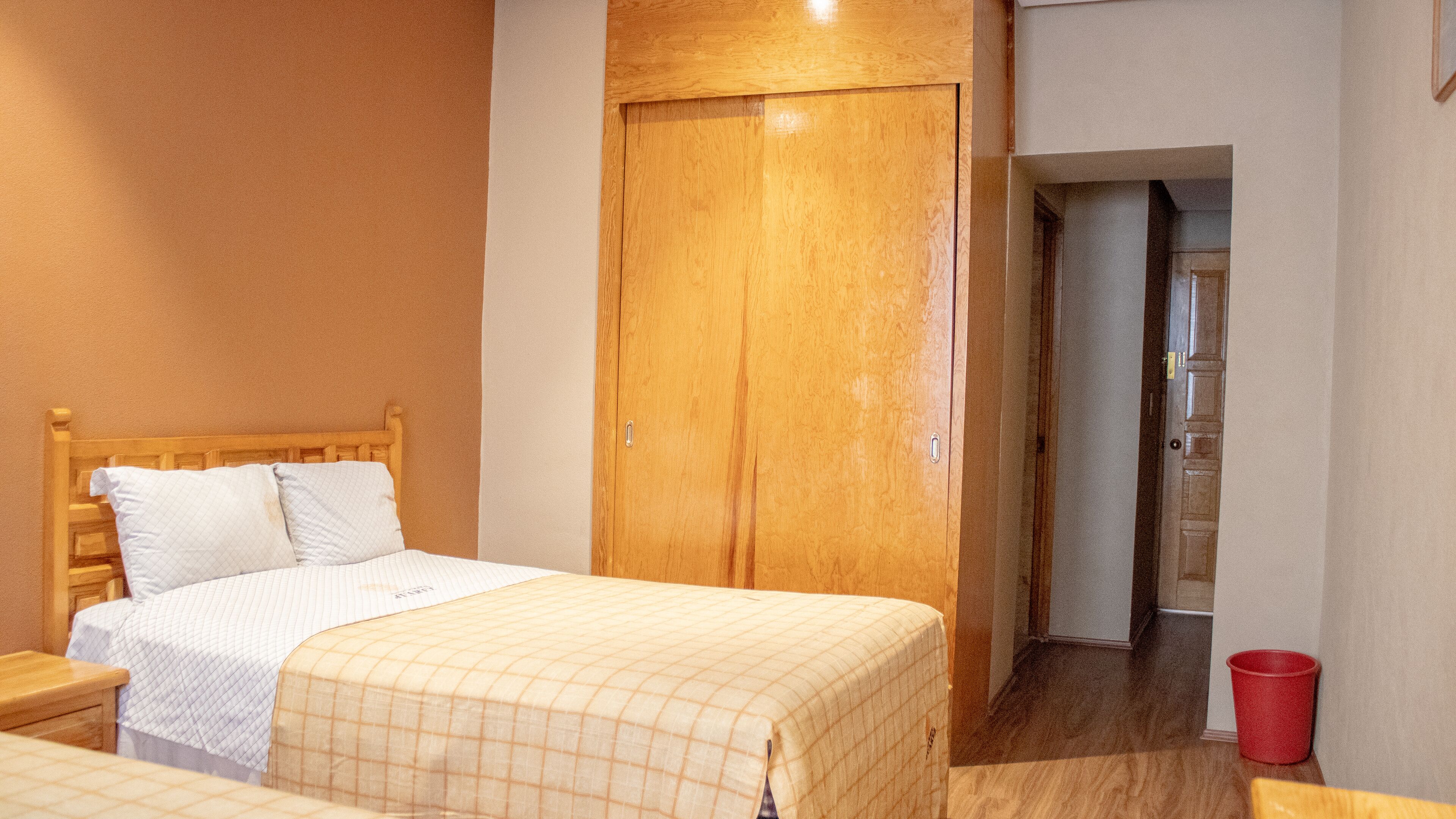 family room | in-room safe, bed sheets