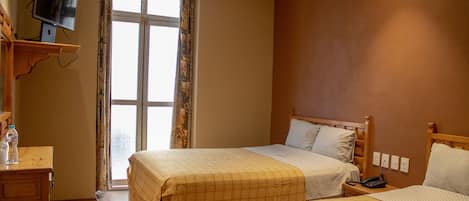 Perhehuone | Tallelokero huoneessa, vuodevaatteet