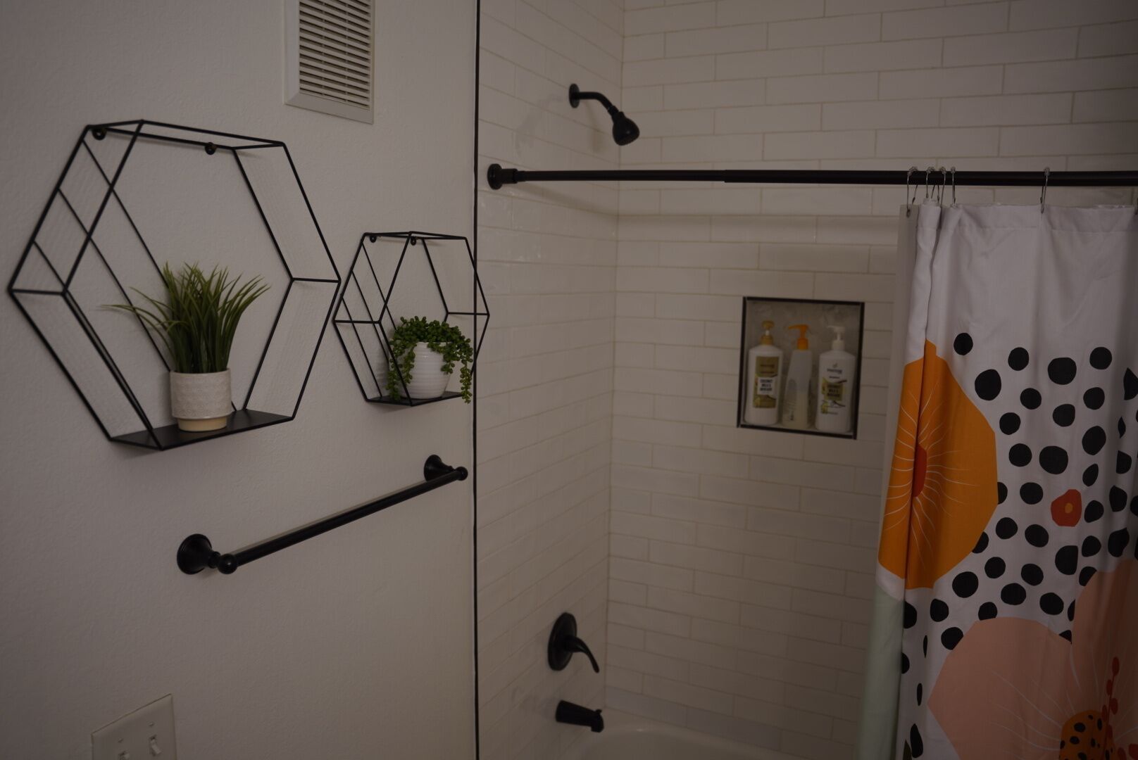 Combined shower/tub, hair dryer, towels, soap