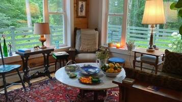 TV, fireplace, books, printers