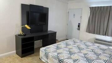 Premium bedding, desk, laptop workspace, free WiFi