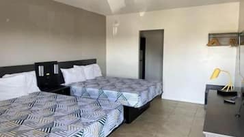 Premium bedding, desk, laptop workspace, free WiFi