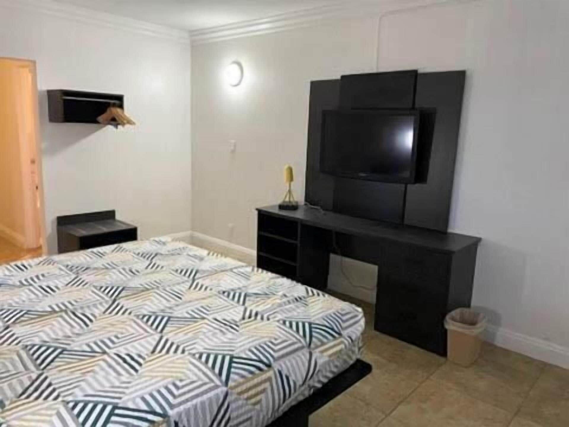 Premium bedding, desk, laptop workspace, free WiFi