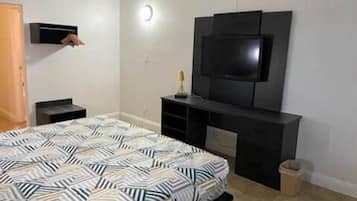 Premium bedding, desk, laptop workspace, free WiFi