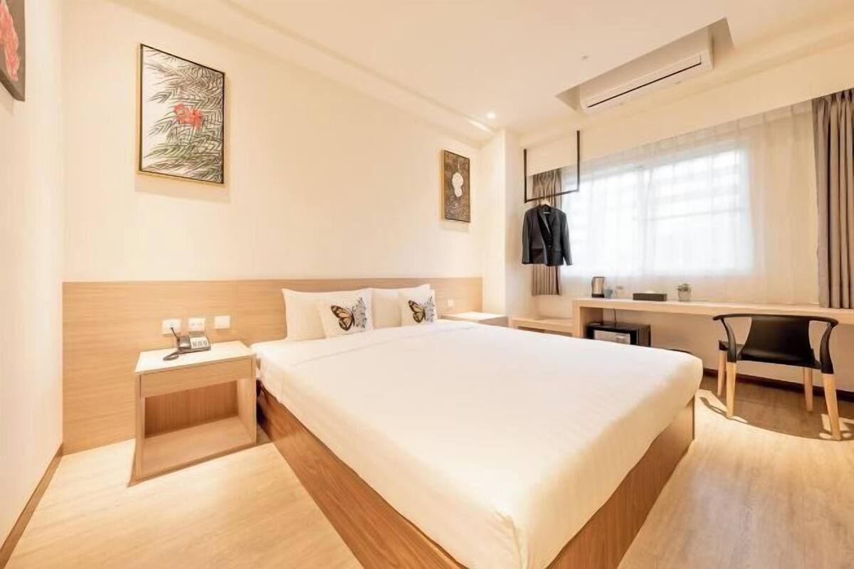 Premium bedding, down comforters, desk, laptop workspace