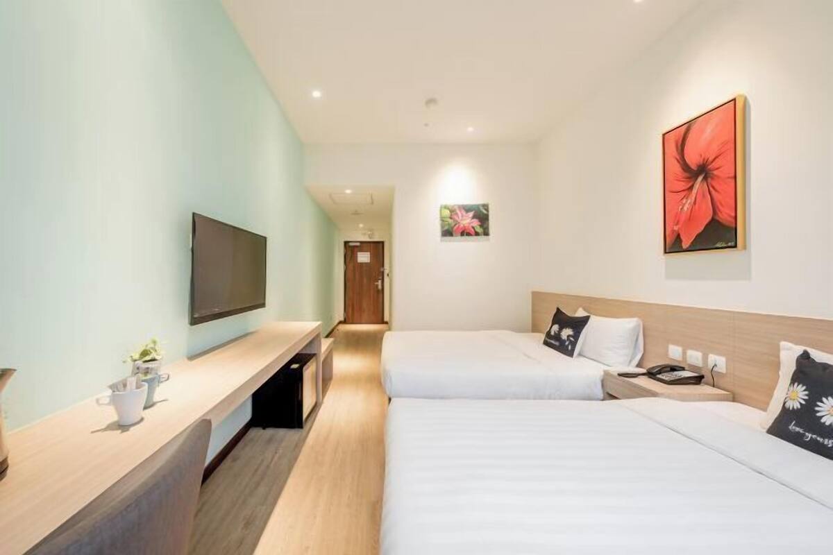 Premium bedding, down comforters, desk, laptop workspace