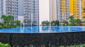 Outdoor pool - Comfort And Homey 2Br At Springlake Apartment Bekasi (Bekasi)