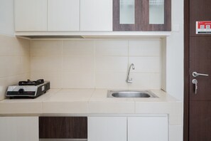 Room | Private kitchen | Fridge, stovetop, cookware/dishes/utensils - Comfy And Nice 1Br Saveria Apartment (Pagedangan)