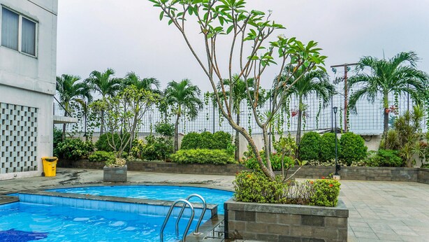 Outdoor pool - Cozy Stay Studio Apartment At Margonda Residence 5 (Depok)
