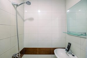 Habitación | Baño | Ducha y toallas