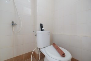 Habitación | Baño | Regadera y toallas 