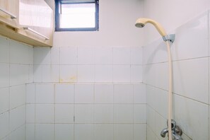 Room | Bathroom | Shower, towels - Cozy And Simply Studio At Kebagusan City Apartment (Jakarta)