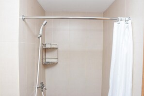 Room | Bathroom | Shower, towels - Comfort Studio at LRT City Jatibening Apartment (Bekasi)