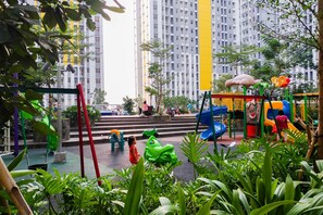 Children’s play area – outdoor - Simply Good Studio Room Apartment At Springlake Summarecon (Bekasi)