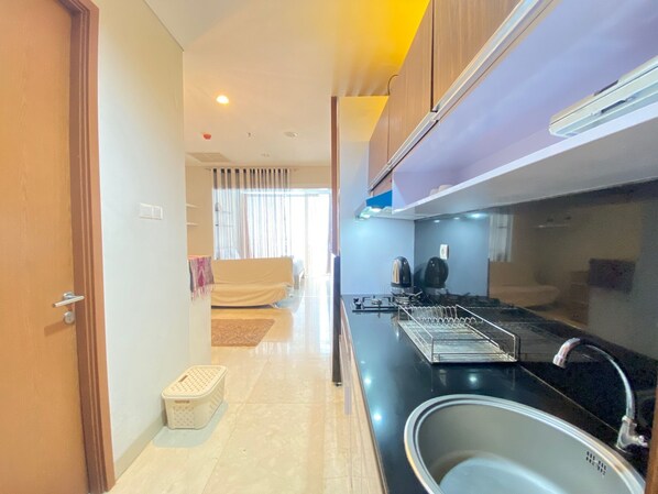 Room | 1 bedroom, free WiFi, bed sheets - Pleasant 1Br Deluxe At Dago Suites Apartment Near Itb (Bandung)