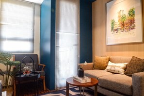 Room | Living room | TV - Exquisite 1Br Apartment At Puri Mas (Surabaya)