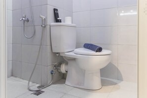 Habitación | Baño | Regadera y toallas 