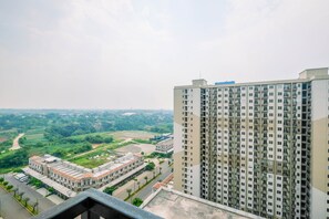 View from property - Comfy 2Br With Modern Style Podomoro Golf View Apartment By Travelio (Gunung Putri)