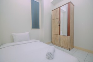 2 bedrooms, free WiFi, bed sheets - Best Location 2Br Apartment At Podomoro Golf View With Modern Design By Travelio (Gunung Putri)