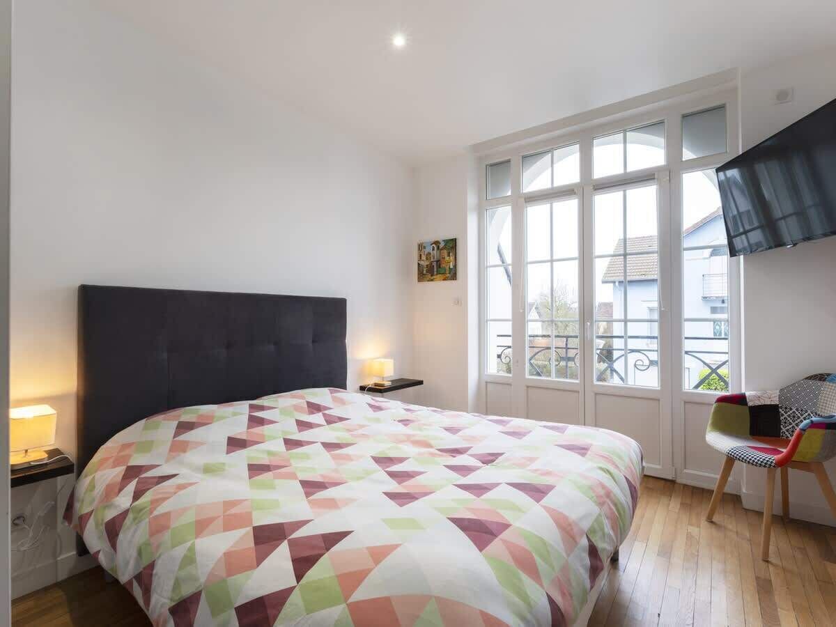 2 dormitorios, tabla de planchar con plancha, wifi gratis y ropa de cama