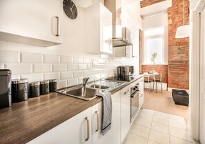 Grand Apartment, 1 Bedroom, City View | Private kitchen | Full-size fridge, microwave, oven, dishwasher