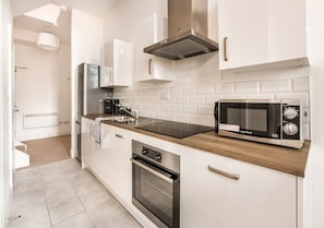 Grand Apartment, 1 Bedroom, City View | Private kitchen | Full-sized fridge, microwave, oven, dishwasher