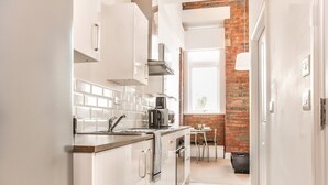 Căn hộ Grand, 1 phòng ngủ, quang cảnh thành phố | Bếp riêng | Tủ lạnh, lò vi sóng, lò nướng, máy rửa bát 