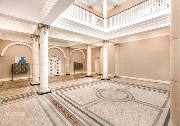 Grand Apartment, 1 Bedroom, City View | Living area | 35-inch TV with cable channels