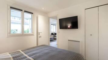 2 slaapkamers, een strijkplank/strijkijzer, gratis wifi, beddengoed