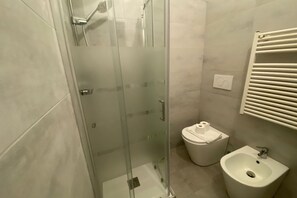 Bathtub, hair dryer, bidet