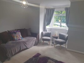 Cottage | Living room | 30-inch TV with digital channels, fireplace