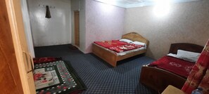 Habitación triple estándar | Ropa de cama