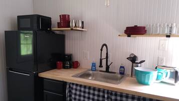 Fridge, microwave, coffee/tea maker, toaster