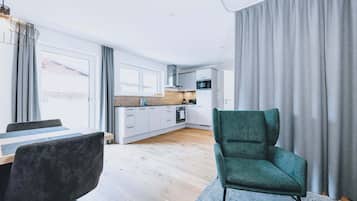 Panoramic Condo | Living area | 100-cm Smart TV with digital channels, TV, Netflix
