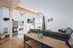 Signature-huoneisto | Oleskelualue | Älytelevisio, Netflix, lämmitetyt lattiat, suoratoistopalvelut