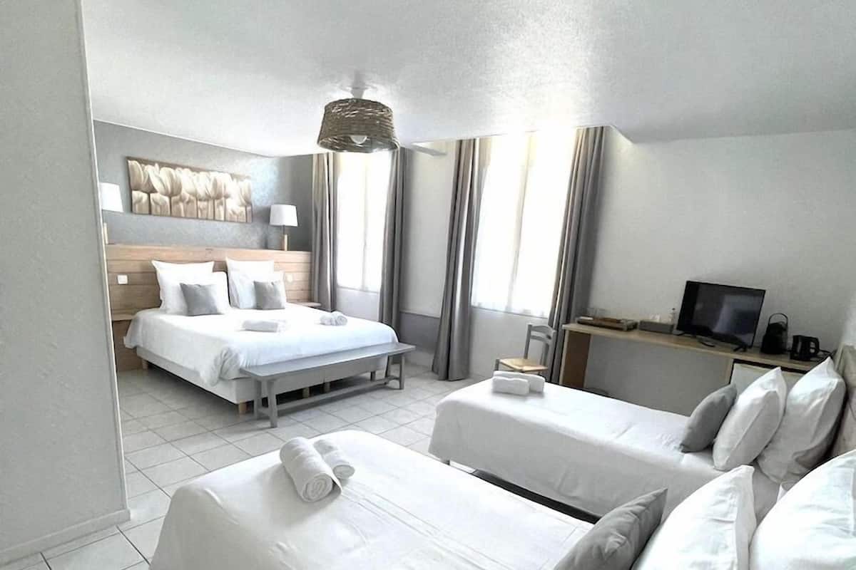 Family Quadruple Room, Park View | Laptop workspace, blackout curtains, free WiFi