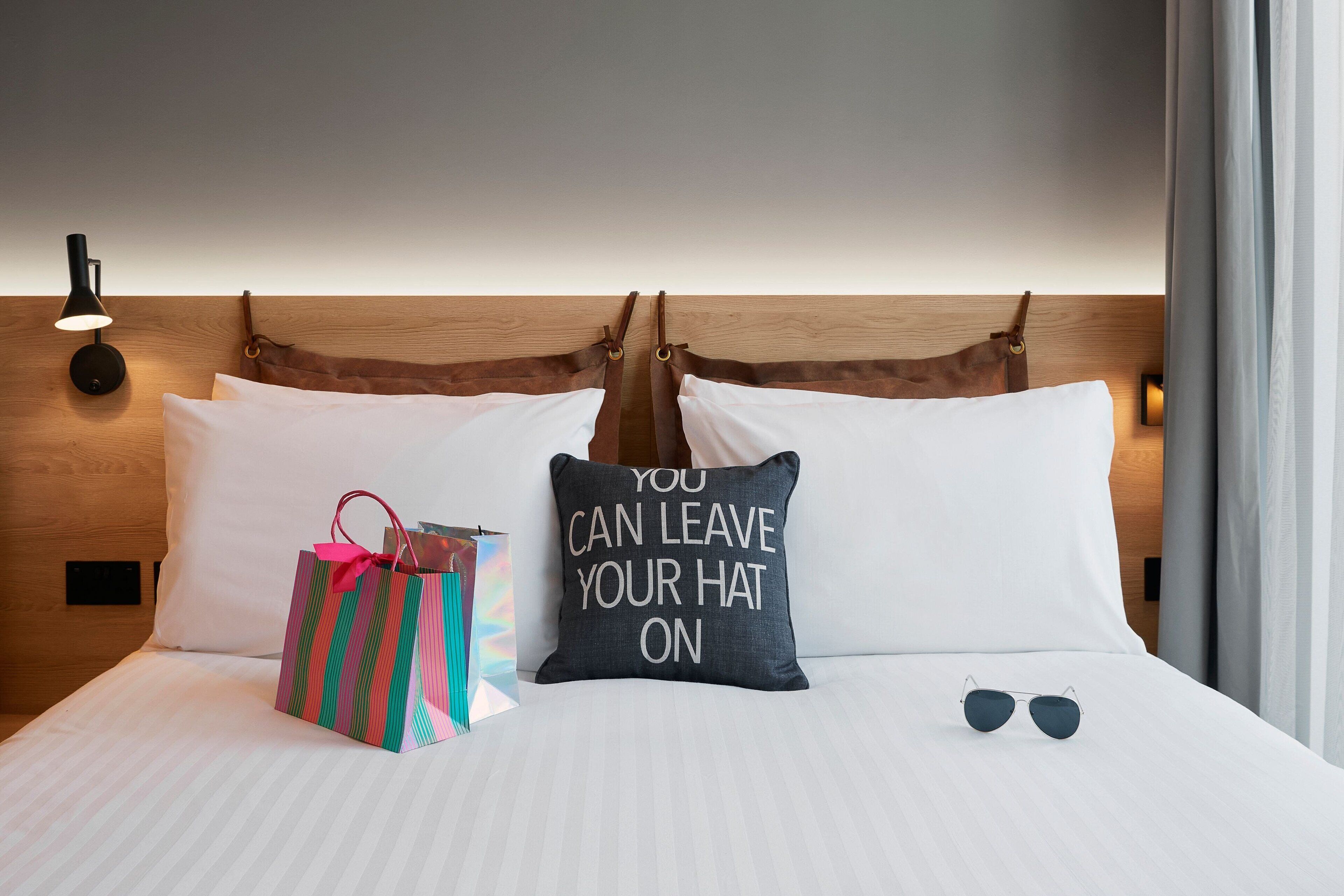 hypo-allergenic bedding, blackout curtains, free cots/infant beds