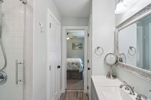 Combined shower/tub, hair dryer, towels, toilet paper