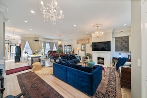 TV, fireplace, books, offices