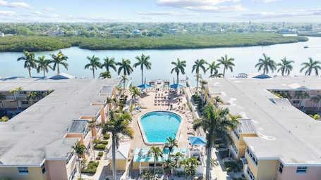 A heated pool. Waterfront 1/1, sleeps 6, walk to beach! #B111