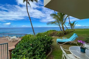 Outdoor dining - Poipu Shores 101A – Oceanfront, Ground Floor, Waves Below Your Lanai (Koloa)